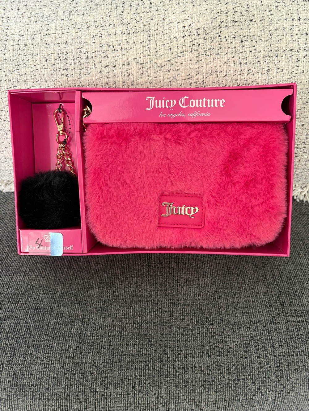 Juicy Couture Hot Pink Faux Fur Wristlet with Black Pom